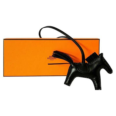 hermes black horse charm|Hermes rodeo pm price.